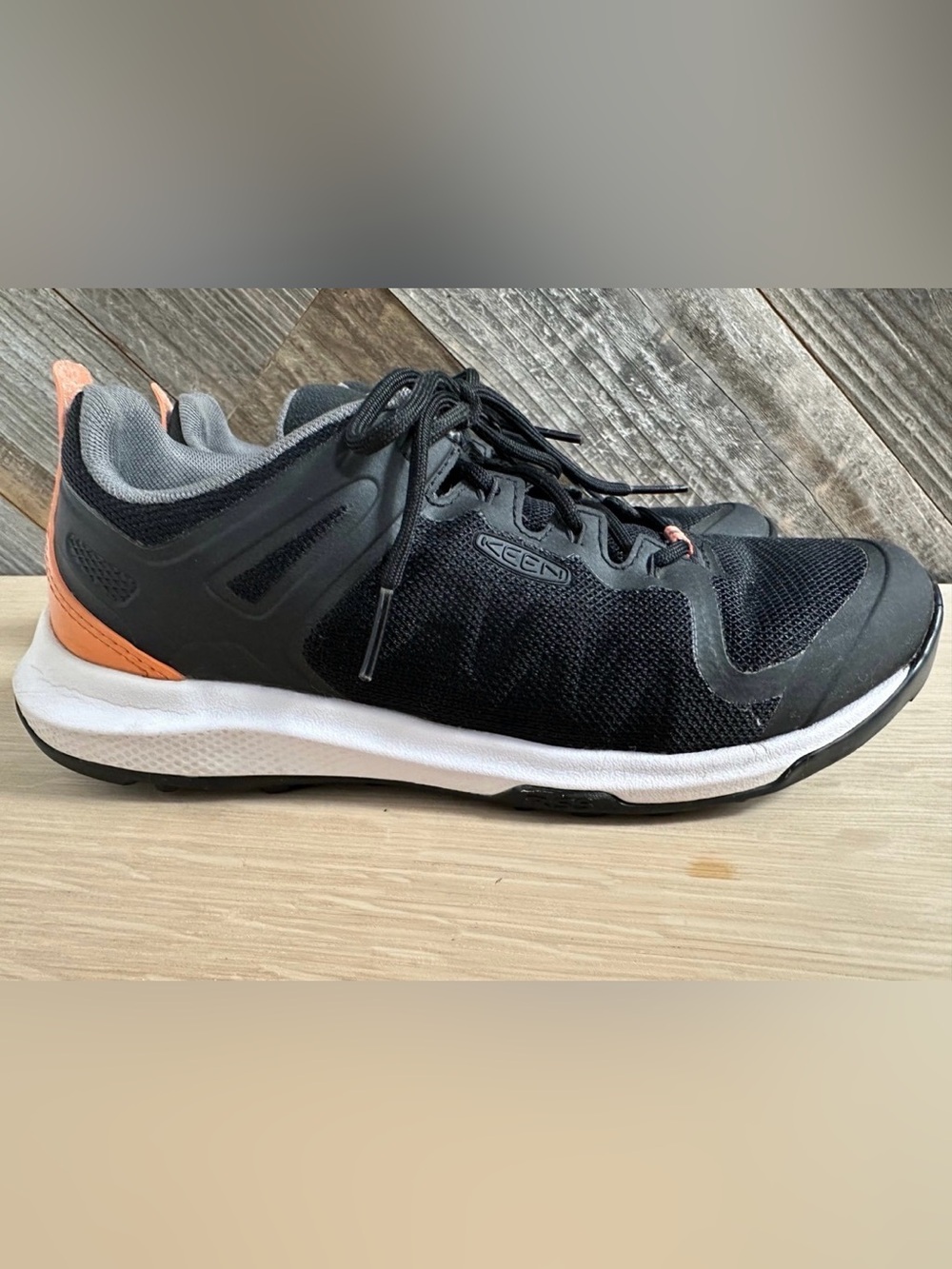 Keen Women's Explore Vent Hiking Shoe in the Trail Black/Orange colorway